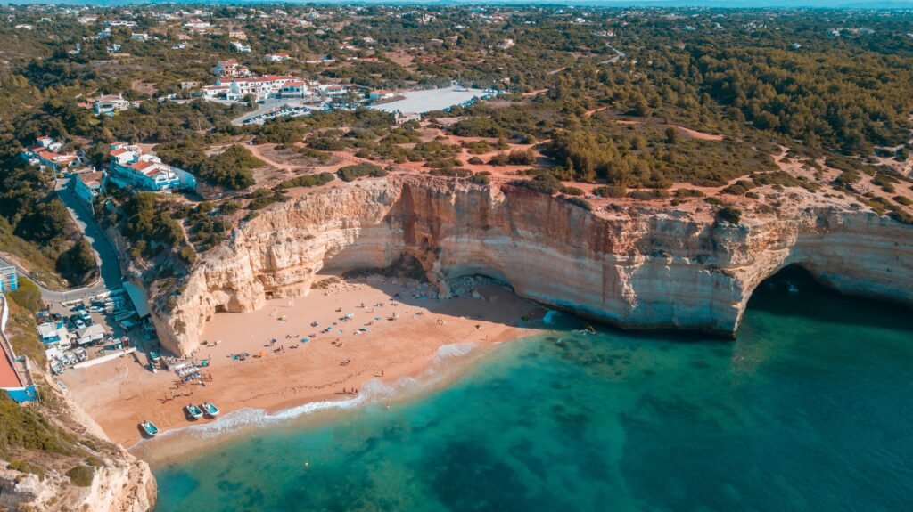 A breathtaking aerial view of a cliffside beach in Algarve, Portugal.